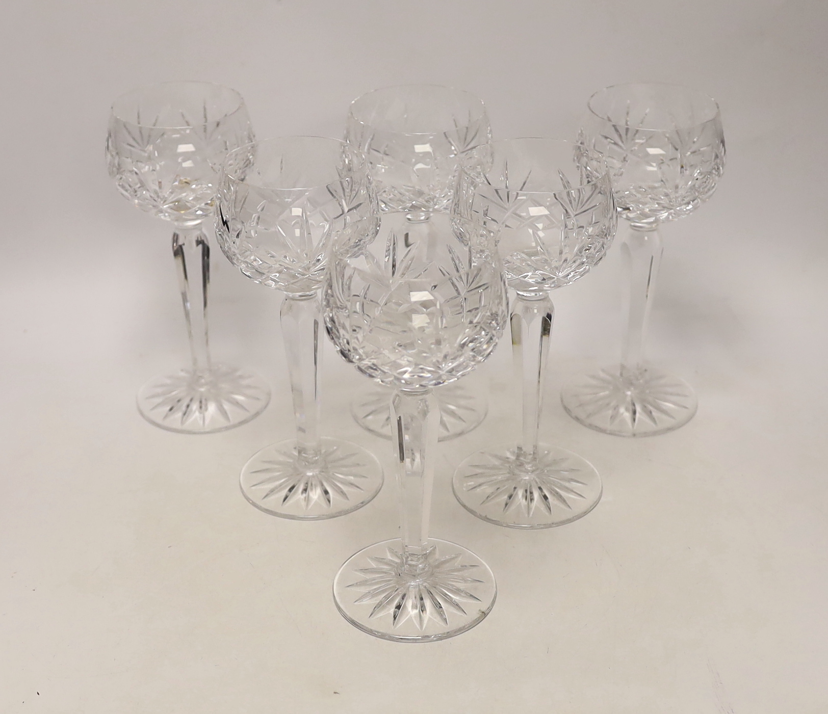 Six cut glass drinking glasses, 18cm high